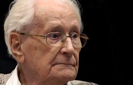 Former bookkeeper at Auschwitz Groening arrives for trial in Lueneburg