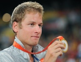 Alex Schwazer of Italy poses on the podi