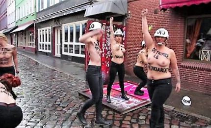 8 marzo, ad Amburgo Femen demoliscono il muro del quartiere rosso