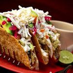 Dalla poutine ai tacos: l’itinerario gastronomico dei Mondiali